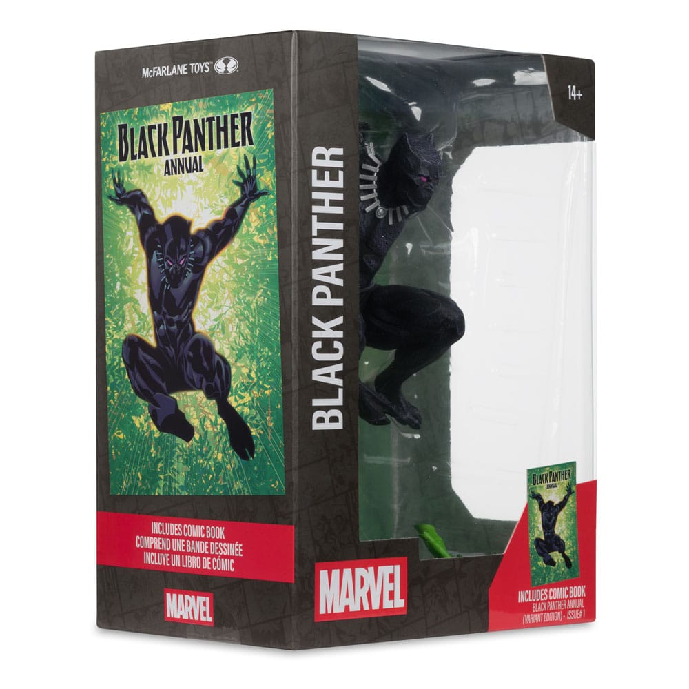 Black Panther-beeldje in zwart pak met zilverkleurige halsketting, gehurkt in een donkergrijze kartonnen doos met kunststof venster. De verpakking heeft rode vlakken en een groen-gele stripillustratie, tegen een witte achtergrond.